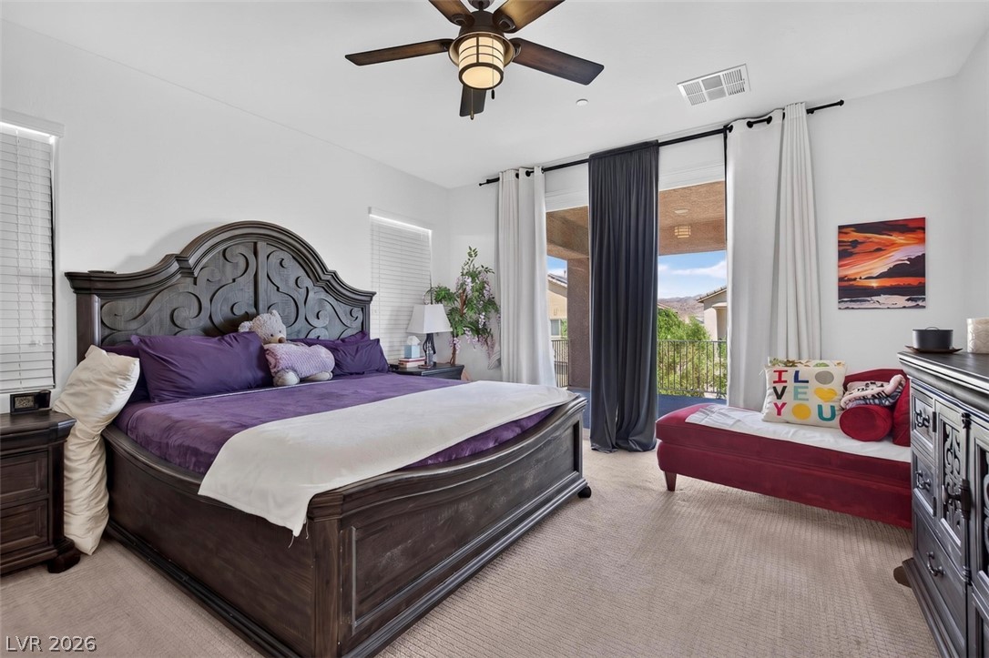 1824 Redland Ridge Street Henderson, NV 89002 - Photo 36 of 69 Relax in a generously sized bedroom featuring a private balcony access.