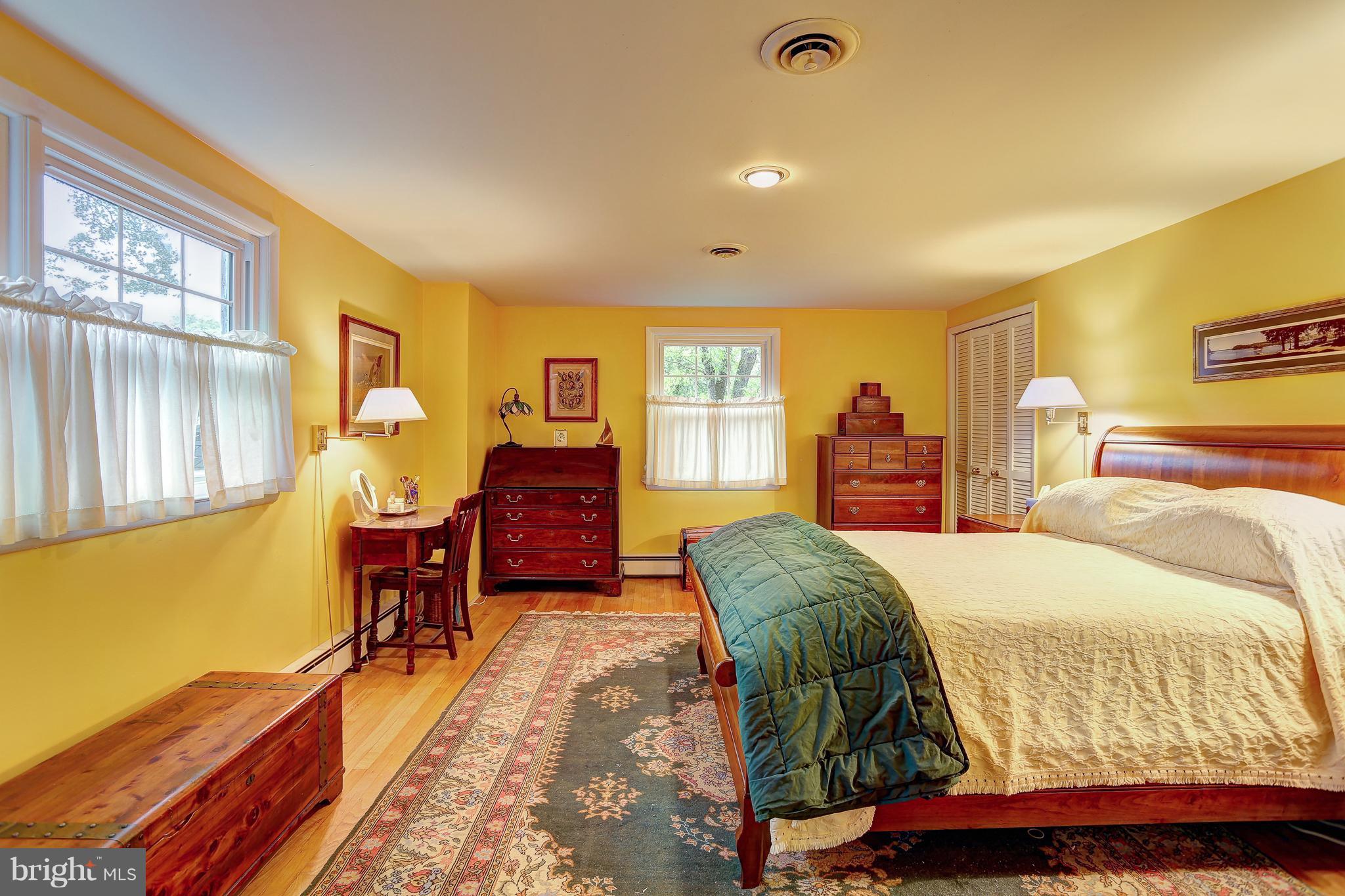 378 Dutch Ship Road Pasadena, MD 21122 - Photo 14 of 27 Master bedroom with hardwood floors