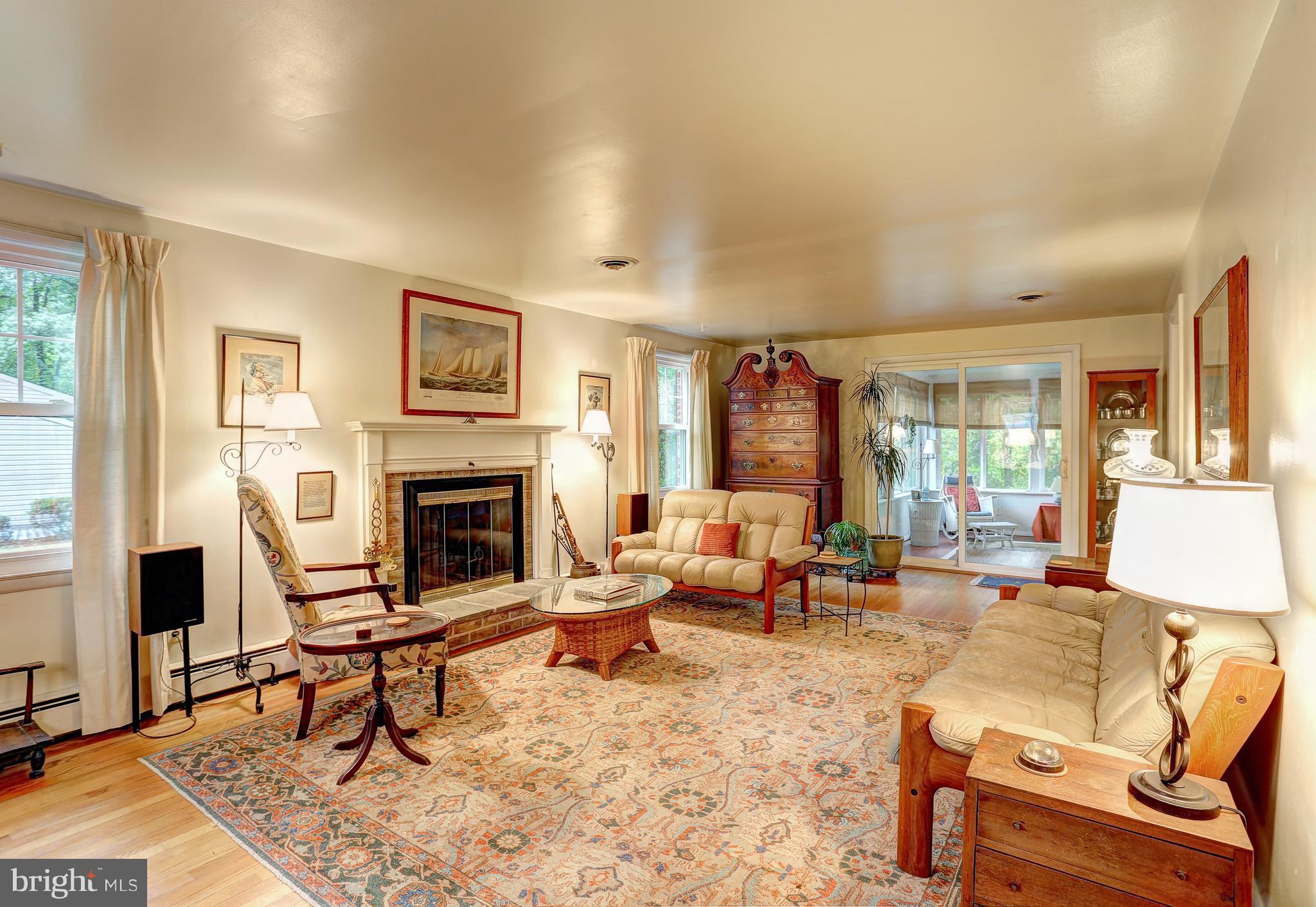 Living Room with sliders to sunroom