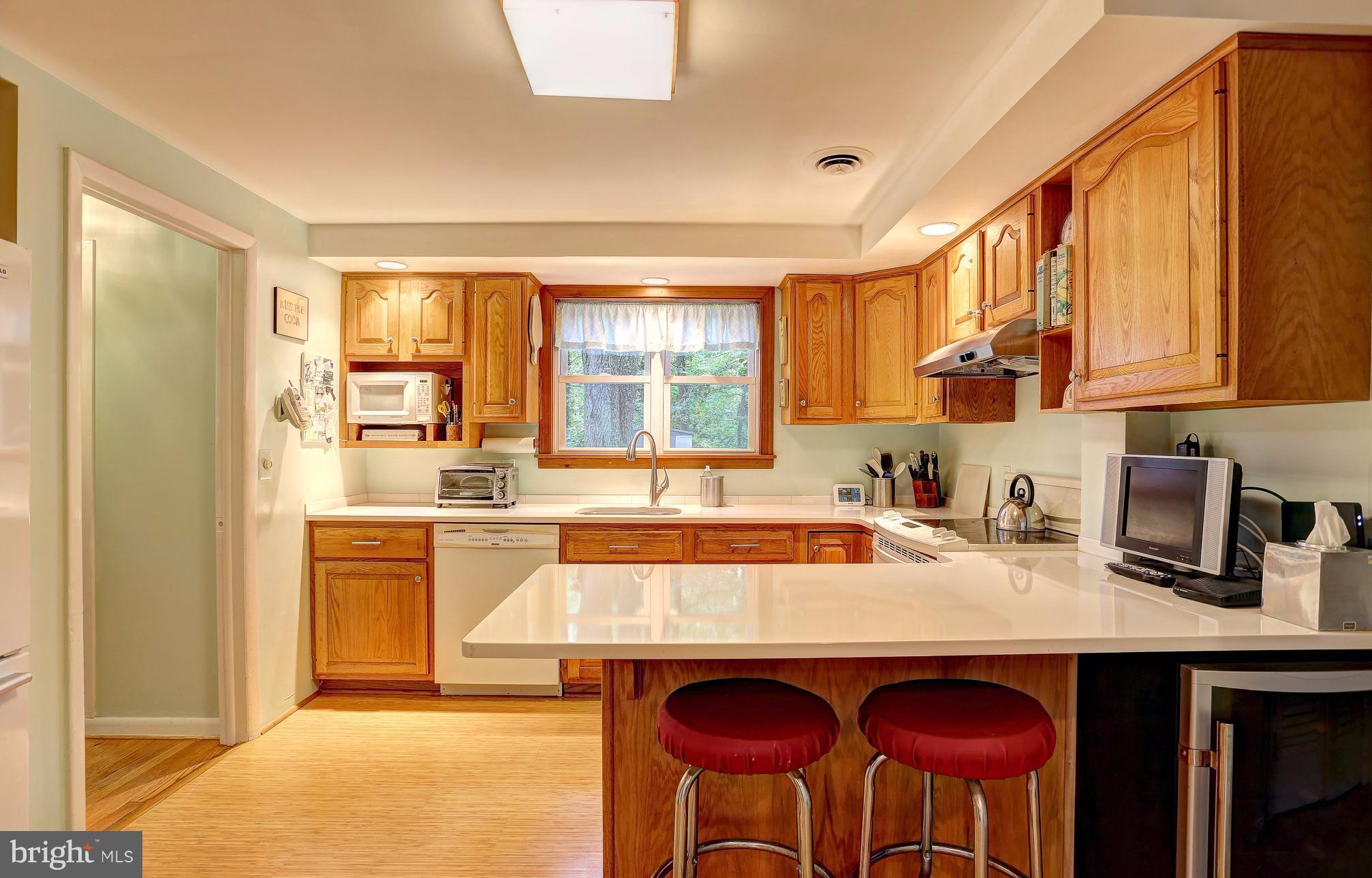 378 Dutch Ship Road Pasadena, MD 21122 - Photo 8 of 27 Kitchen with corian counters