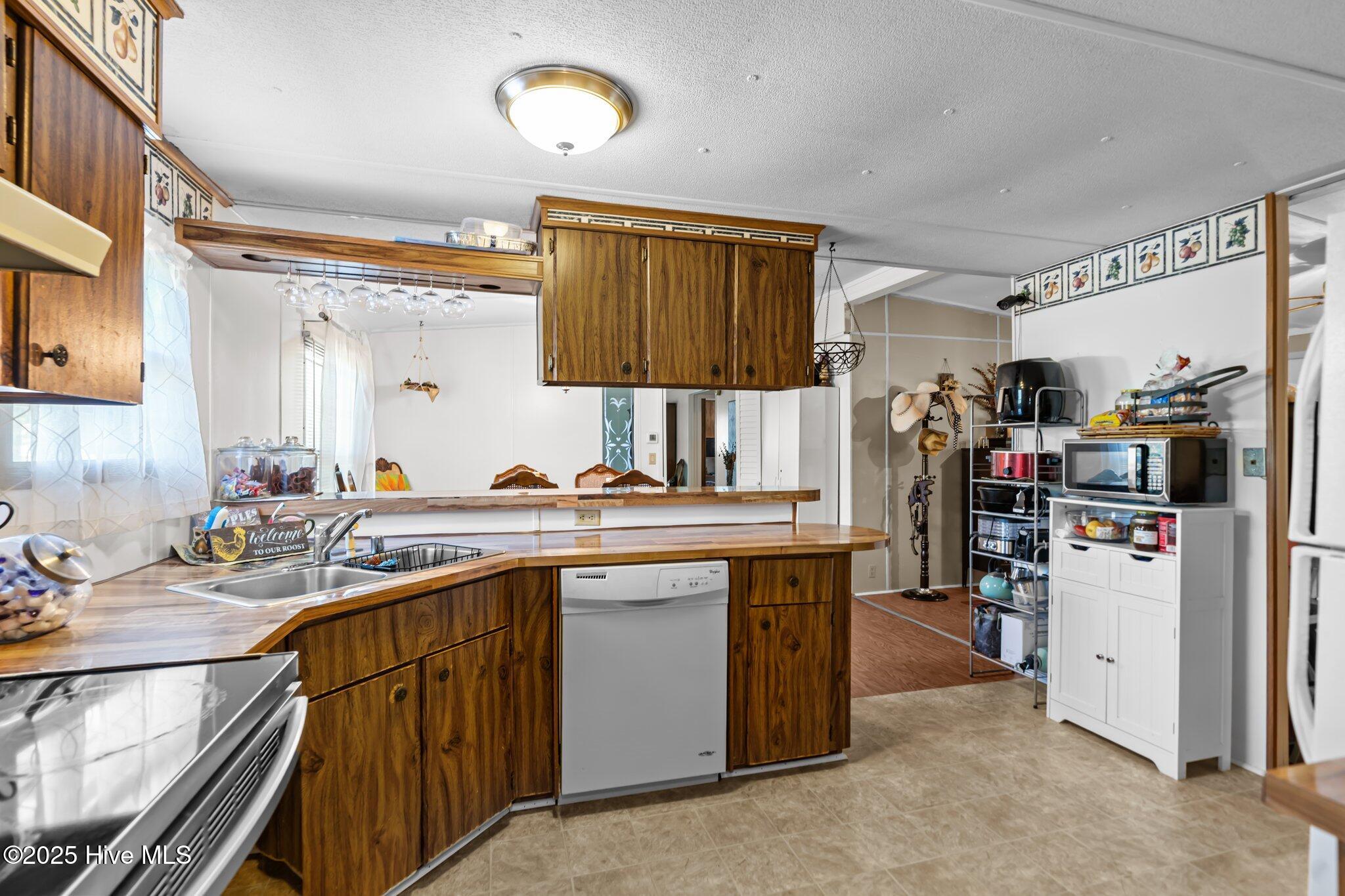 1850 Thorpe Landing Road Southwest Ocean Isle Beach, NC 28469 - Photo 14 of 30 kithcen 3