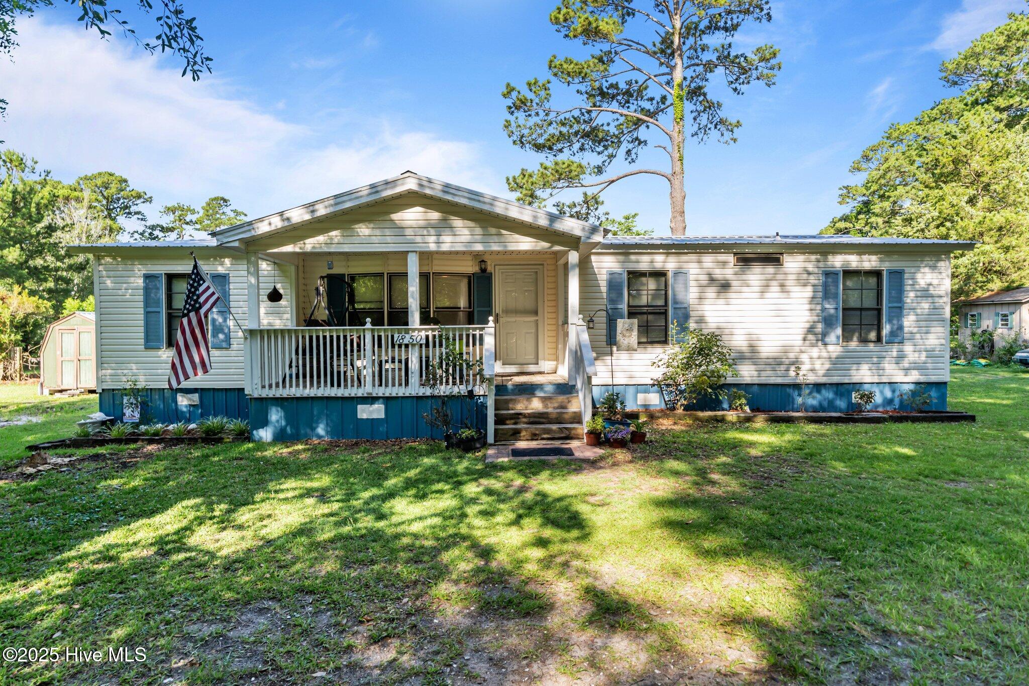 1850 Thorpe Landing Road Southwest Ocean Isle Beach, NC 28469 - Photo 1 of 30 Front 1