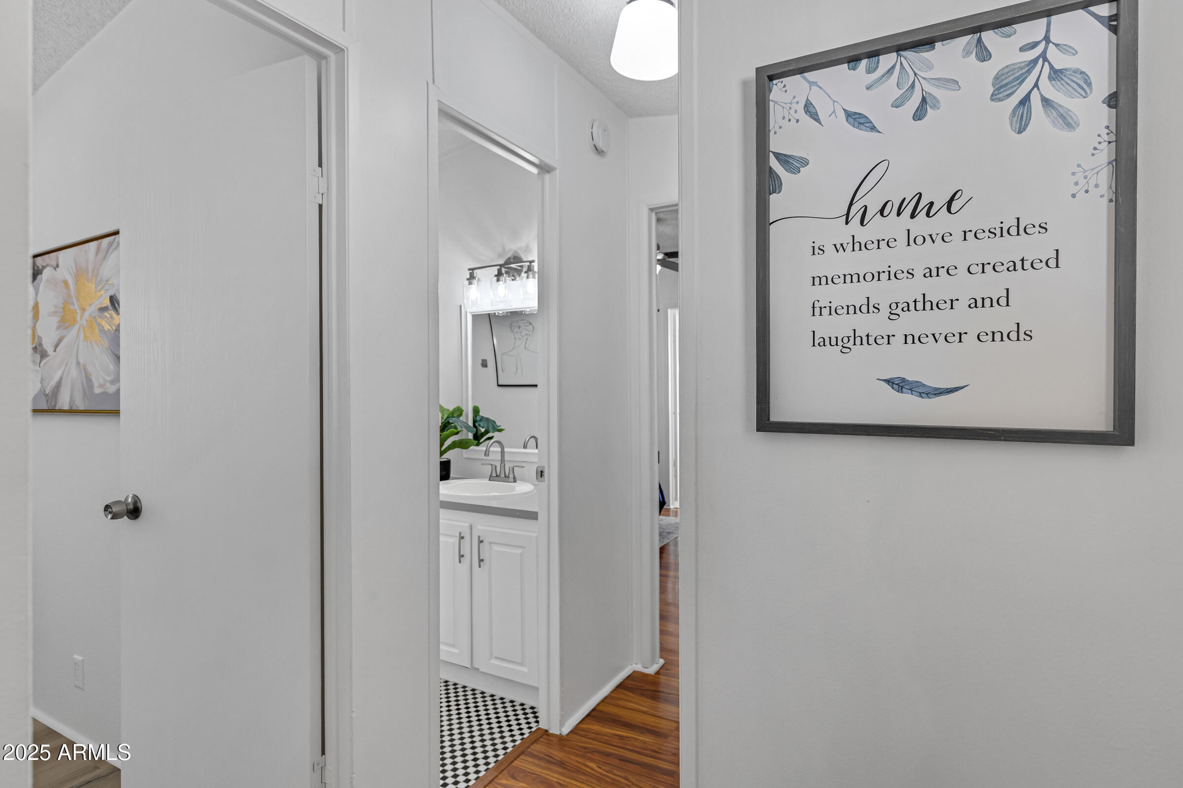 834 South Meridian Road, Unit 164 Apache Junction, AZ 85120 - Photo 10 of 16 a view of a hallway with wooden floor and closet