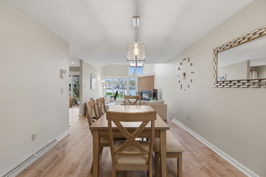 68 South Quinsigamond Avenue, Unit 4 Shrewsbury, MA 01545 - Photo 14 of 37 a view of a dining room with furniture window and wooden floor