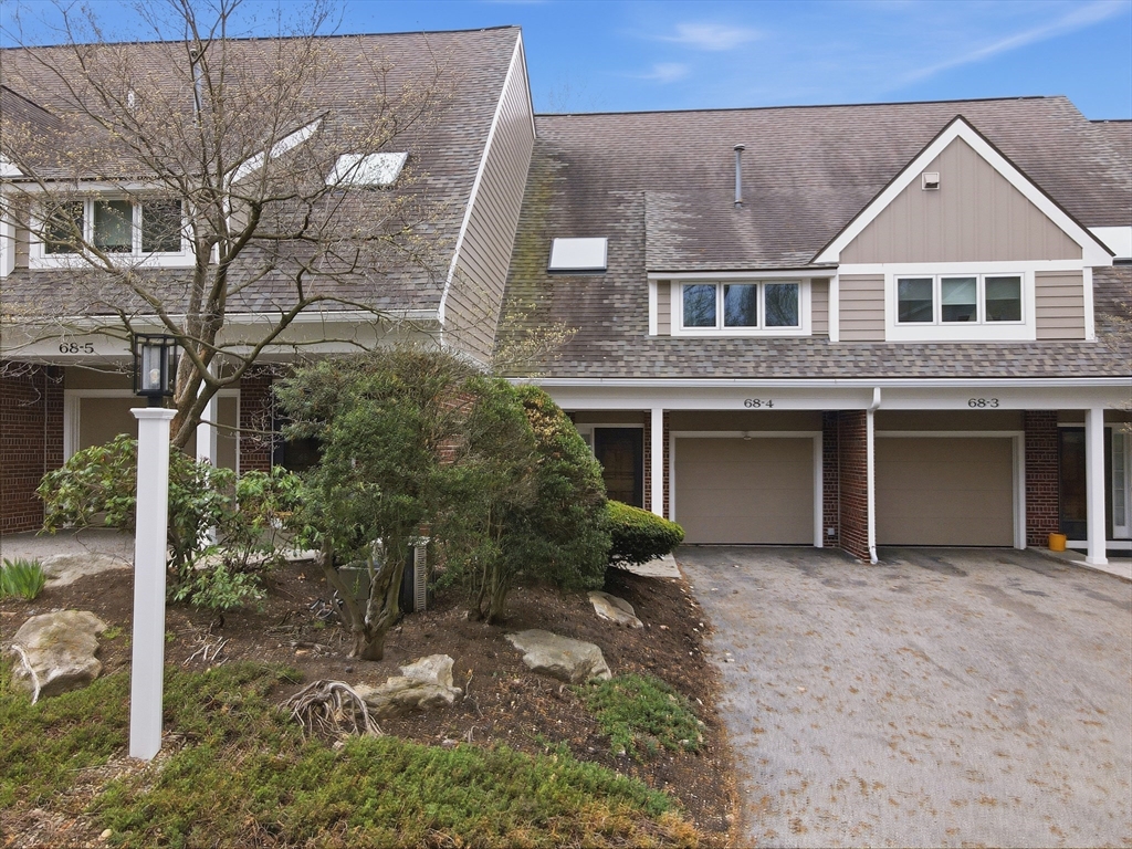 68 South Quinsigamond Avenue, Unit 4 Shrewsbury, MA 01545 - Photo 2 of 37 a front view of a house with a garden
