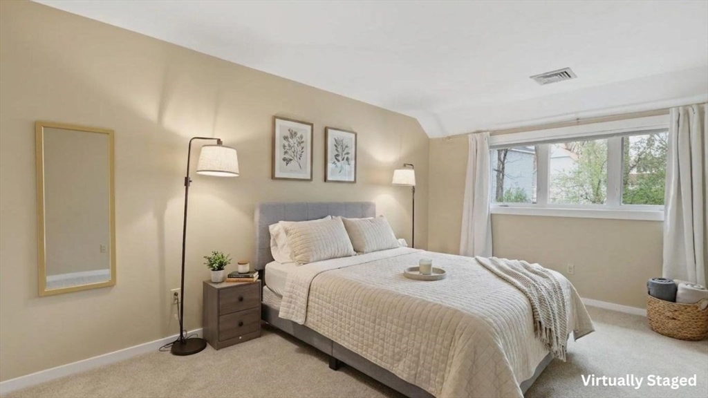 68 South Quinsigamond Avenue, Unit 4 Shrewsbury, MA 01545 - Photo 23 of 37 a bedroom with a bed and a window