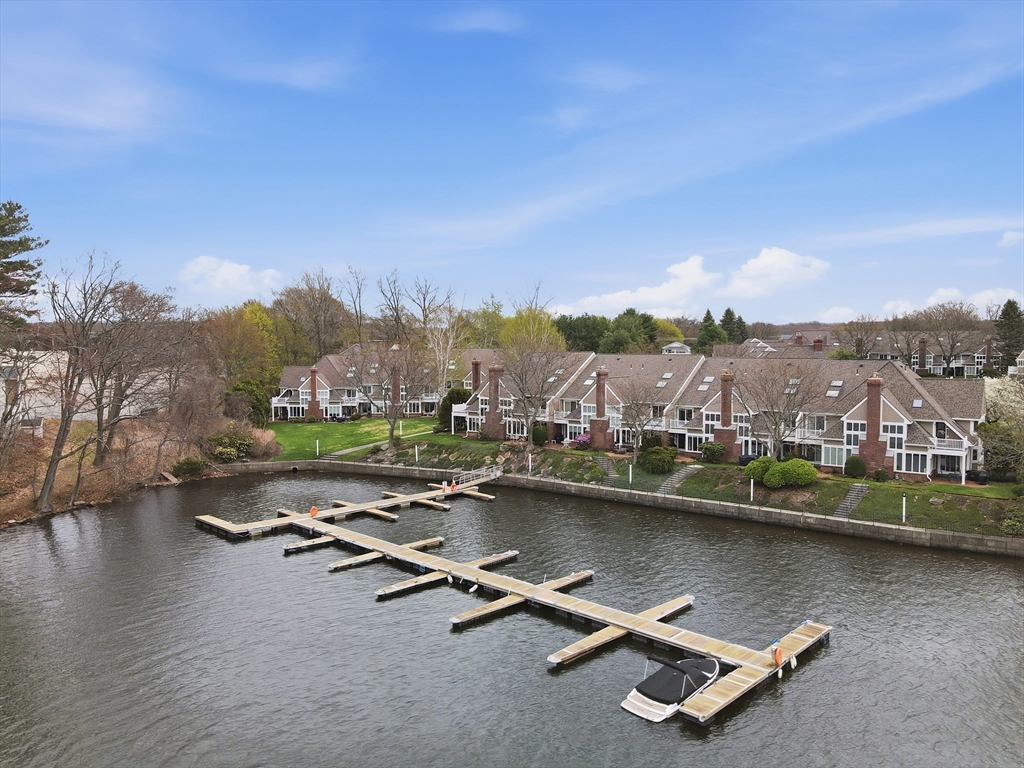 68 South Quinsigamond Avenue, Unit 4 Shrewsbury, MA 01545 - Photo 33 of 37 an aerial view of a city with swimming pool and mountain view