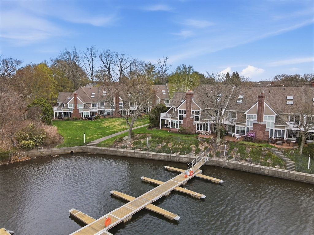 68 South Quinsigamond Avenue, Unit 4 Shrewsbury, MA 01545 - Photo 34 of 37 an aerial view of a house with a garden and lake view