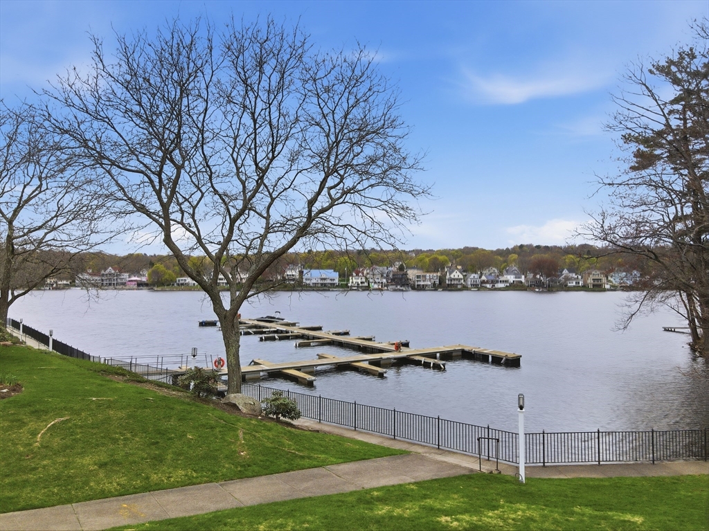 68 South Quinsigamond Avenue, Unit 4 Shrewsbury, MA 01545 - Photo 36 of 37 a view of a lake with houses in the back