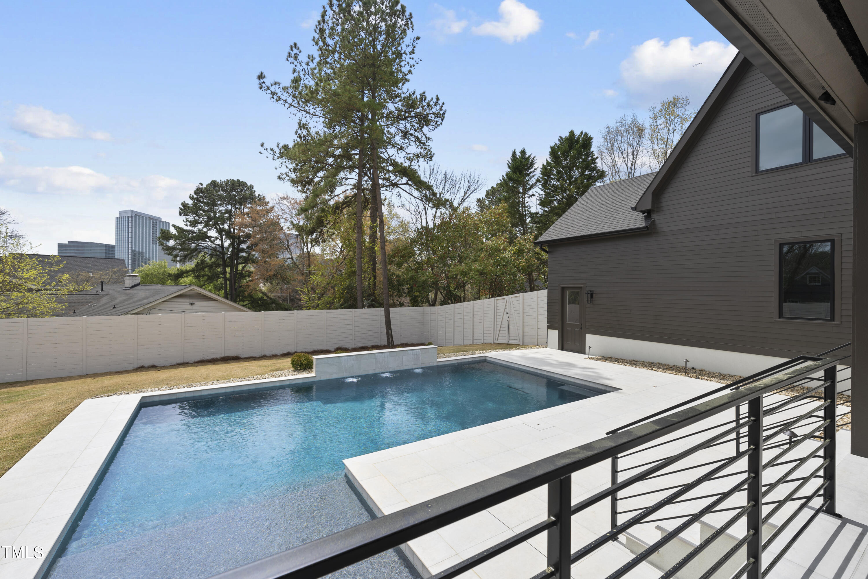 100 East Rowan Street Raleigh, NC 27609 - Photo 25 of 58 a view of a swimming pool with an outdoor seating