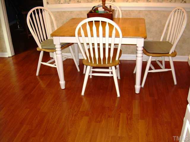 1013 Donphil Road Durham, NC 27712 - Photo 8 of 19 lovely laminate hardwood runs from kitchen into family room....looks great