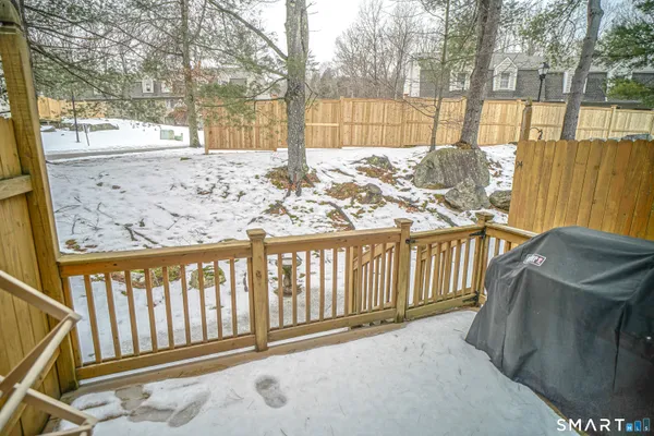 a view of a wooden fence