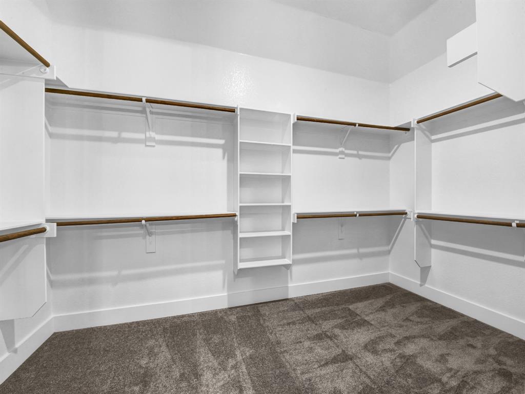 3025 West Frk Way Springtown, TX 76082 - Photo 18 of 26 a view of an empty walk in closet