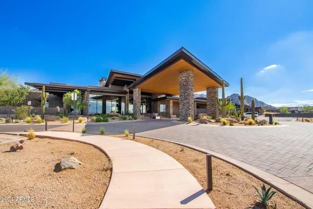 a view of a house with sitting area and furniture