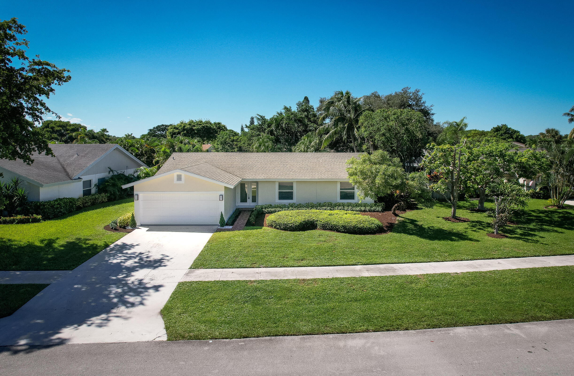 4126 Birchwood Drive Boca Raton, FL 33487 - Photo 1 of 70 91-0204-4126 Birchwood Ter-MLS