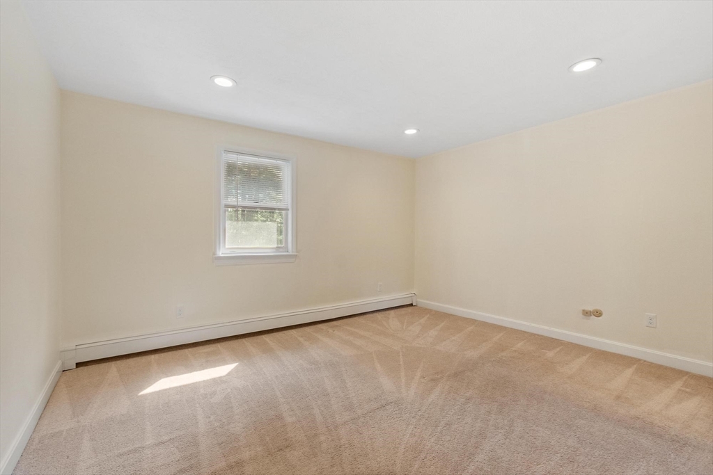 420 Great Road, Unit C1 Acton, MA 01720 - Photo 15 of 29 an empty room with a window