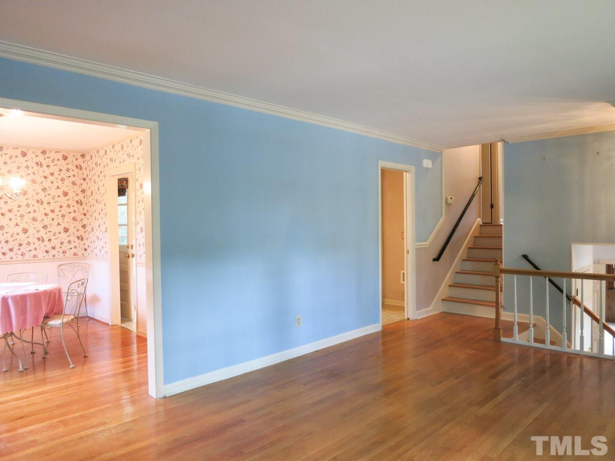 4701 Latimer Road Raleigh, NC 27609 - Photo 4 of 25 Another view of the spacious main level Living Rm.