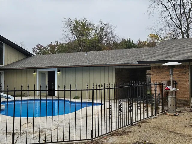 a bathroom with a sink a mirror and a shower