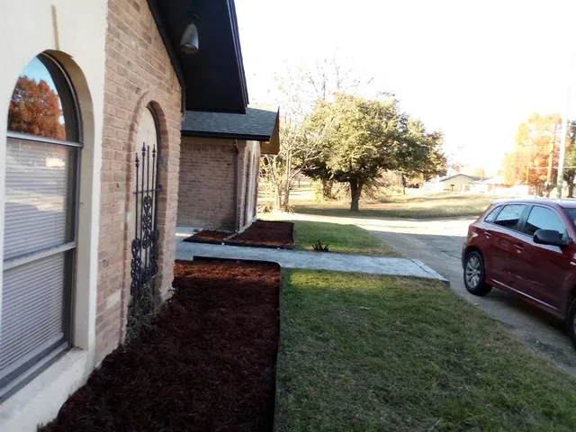 a view of a house with a swimming pool