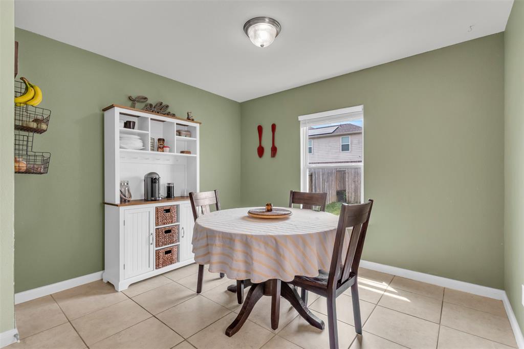 1911 Pilot Point Way Princeton, TX 75407 - Photo 14 of 23 a view of a dining room with furniture