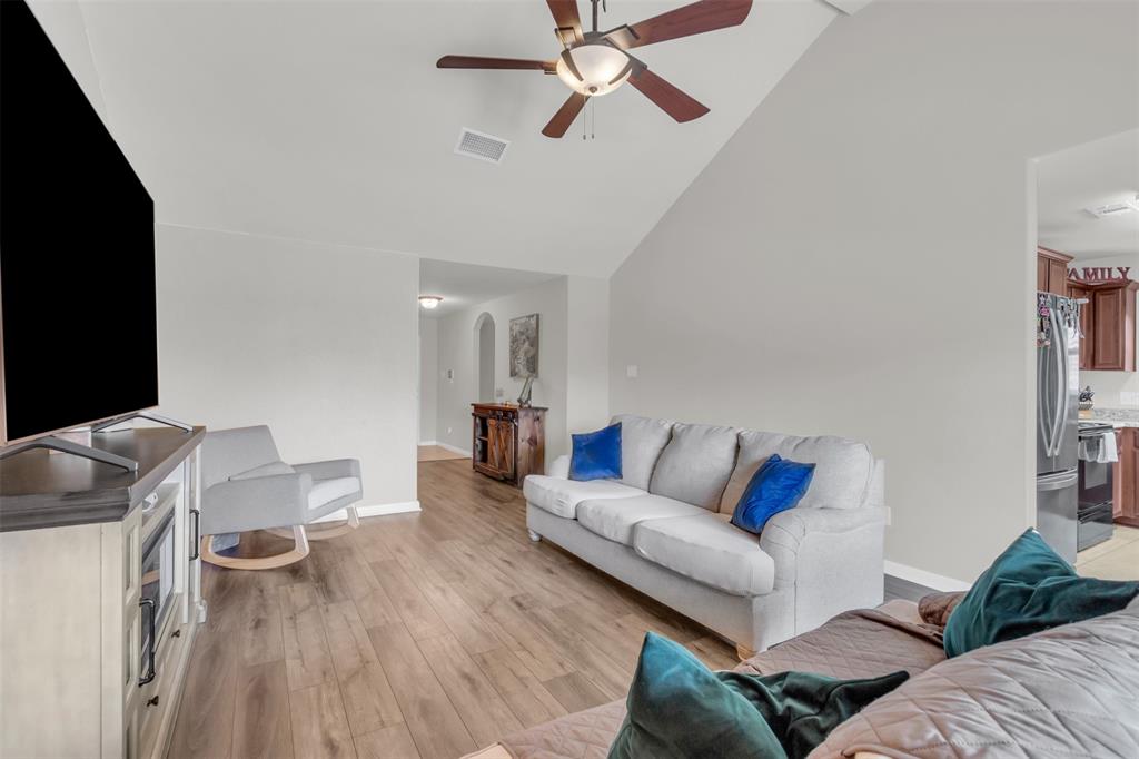 1911 Pilot Point Way Princeton, TX 75407 - Photo 9 of 23 a living room with furniture and a flat screen tv