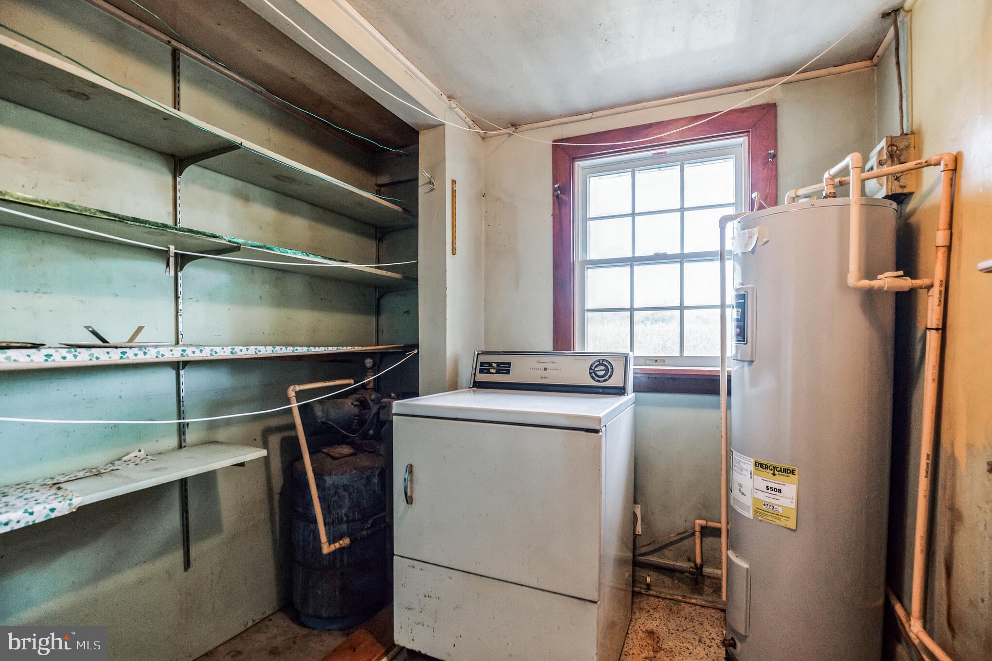 24730 Colton Point Road Clements, MD 20624 - Photo 12 of 15 Laundry & pantry
