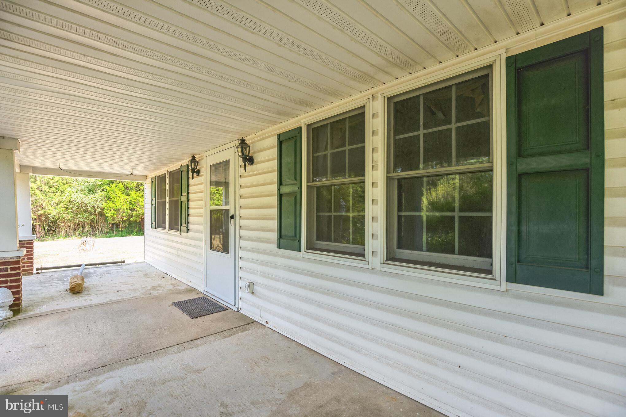 24730 Colton Point Road Clements, MD 20624 - Photo 3 of 15 Front porch