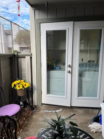 a room with a table and chairs
