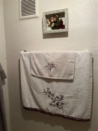 a bedroom with bed and a couch