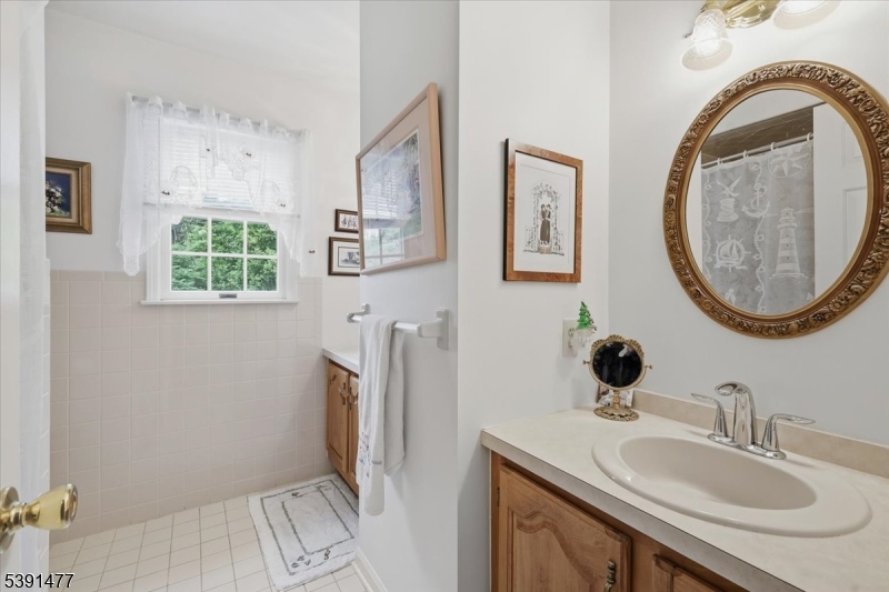 42 Copper Penny Road Flemington, NJ 08822 - Photo 28 of 39 a bathroom with a sink and a mirror