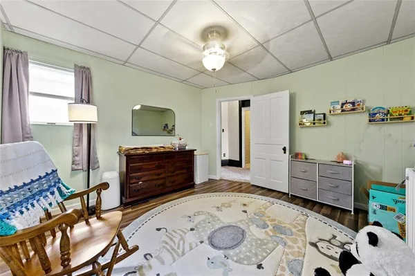 a bedroom with a bed and furniture