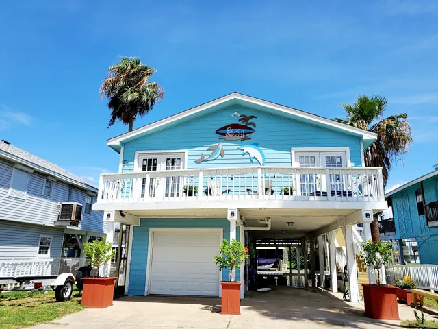 a view of a living room and a garage
