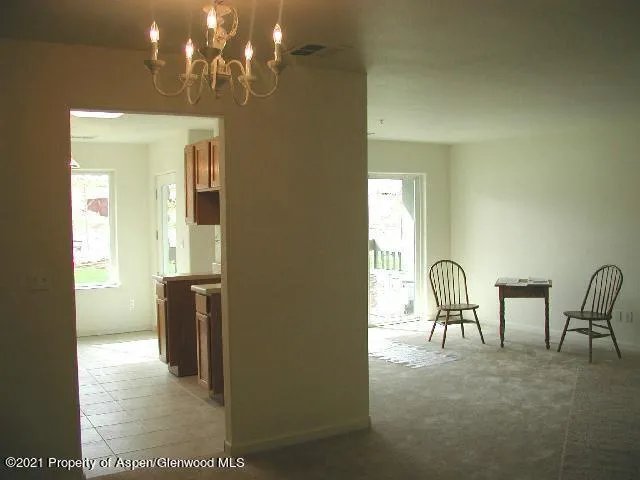 a view of a livingroom with dining area