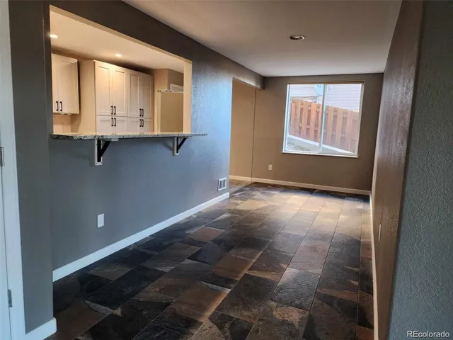 a view of entryway with kitchen island