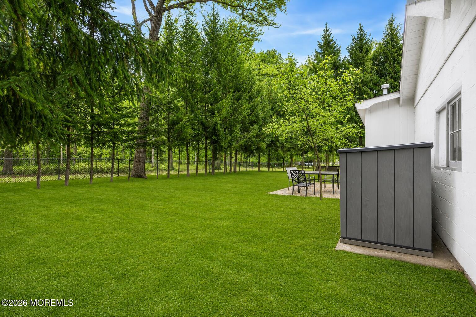 269 Alexander Avenue Howell, NJ 07731 - Photo 30 of 43 a view of a backyard with a garden