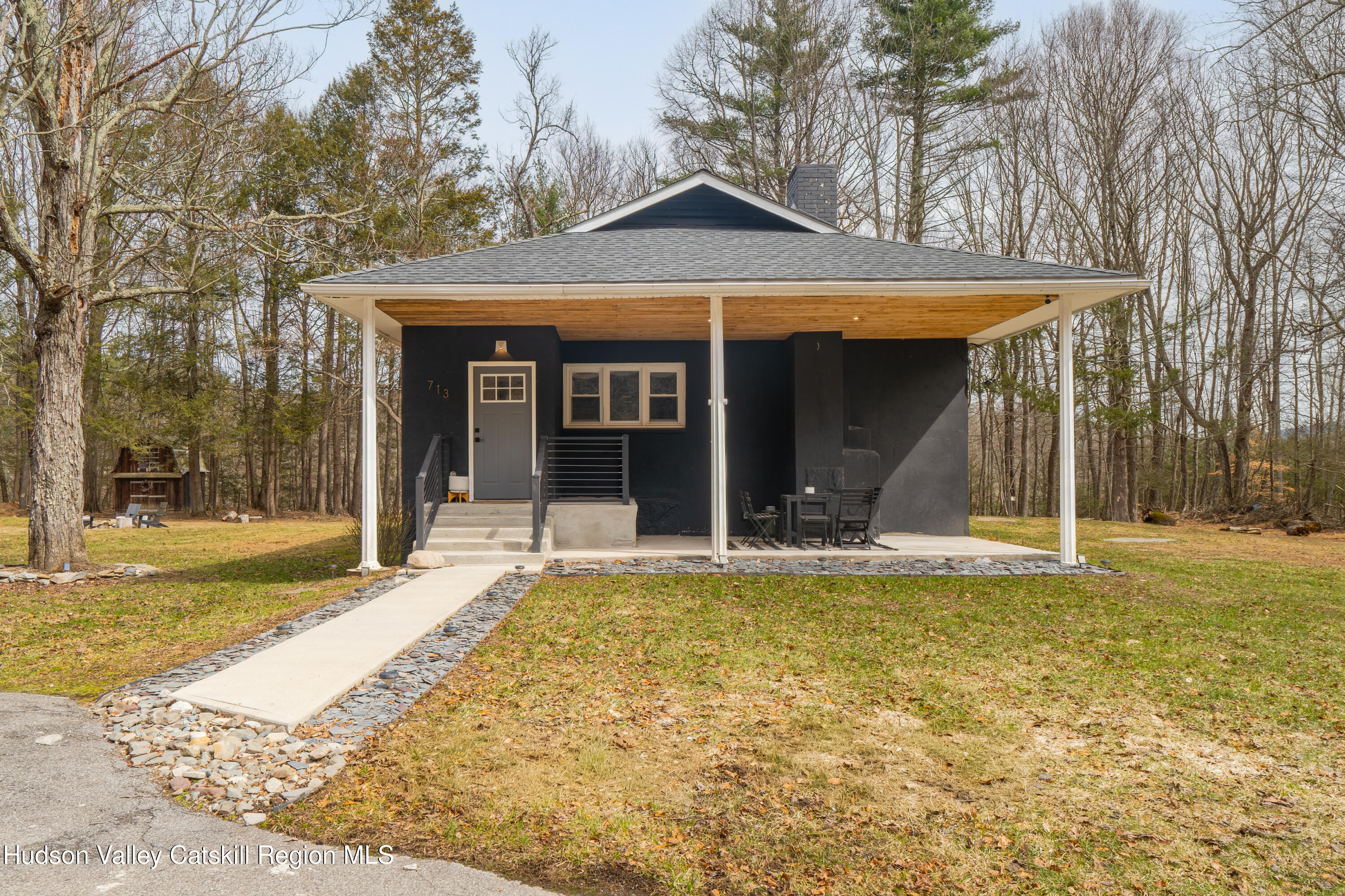 713 Oak Ridge Road Ellenville, NY 12428 - Photo 1 of 53 a view of a house with a yard patio and a slide
