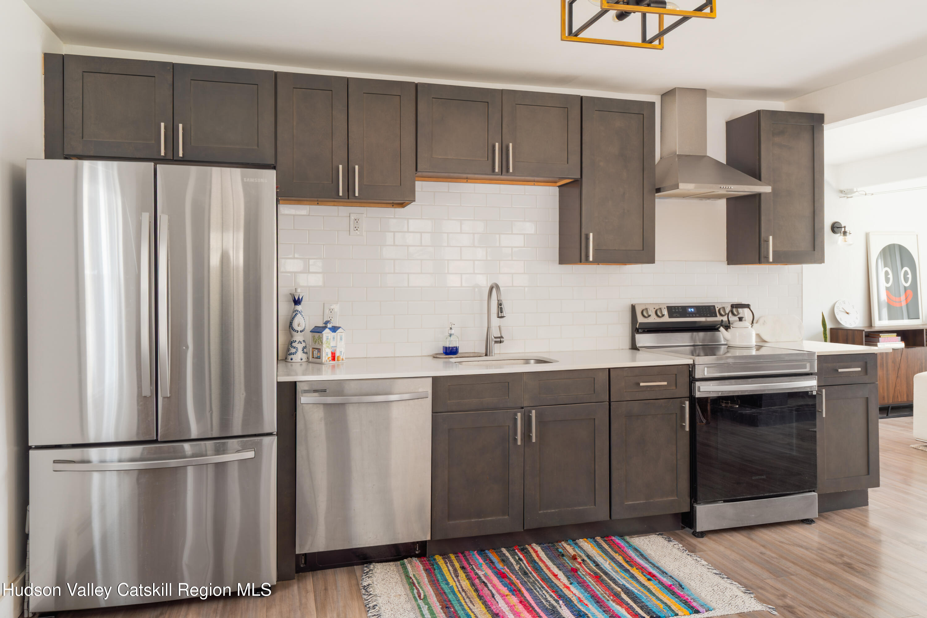 713 Oak Ridge Road Ellenville, NY 12428 - Photo 11 of 53 a kitchen with stainless steel appliances a refrigerator and a sink