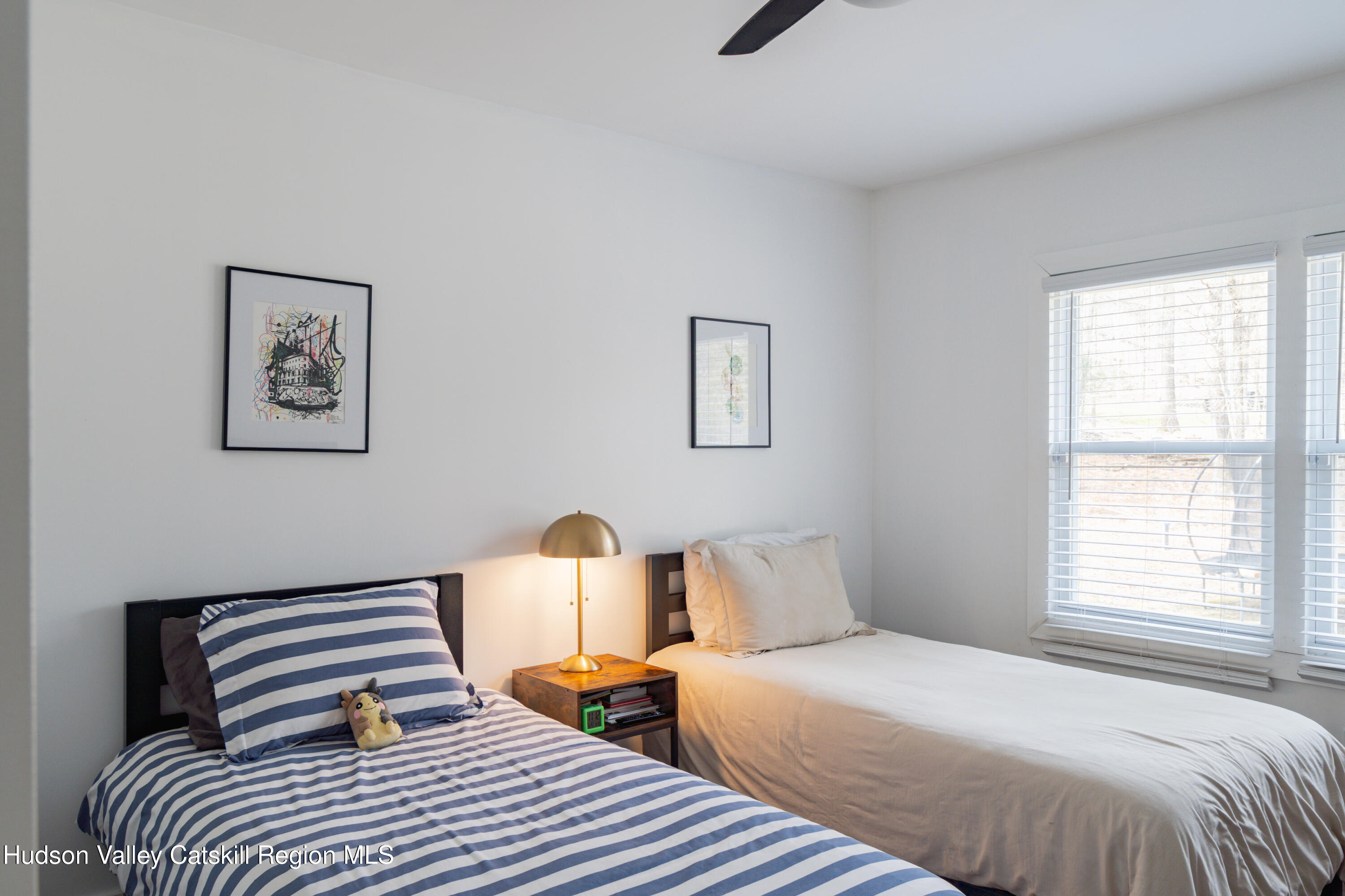 713 Oak Ridge Road Ellenville, NY 12428 - Photo 13 of 53 a bedroom with bed and a window