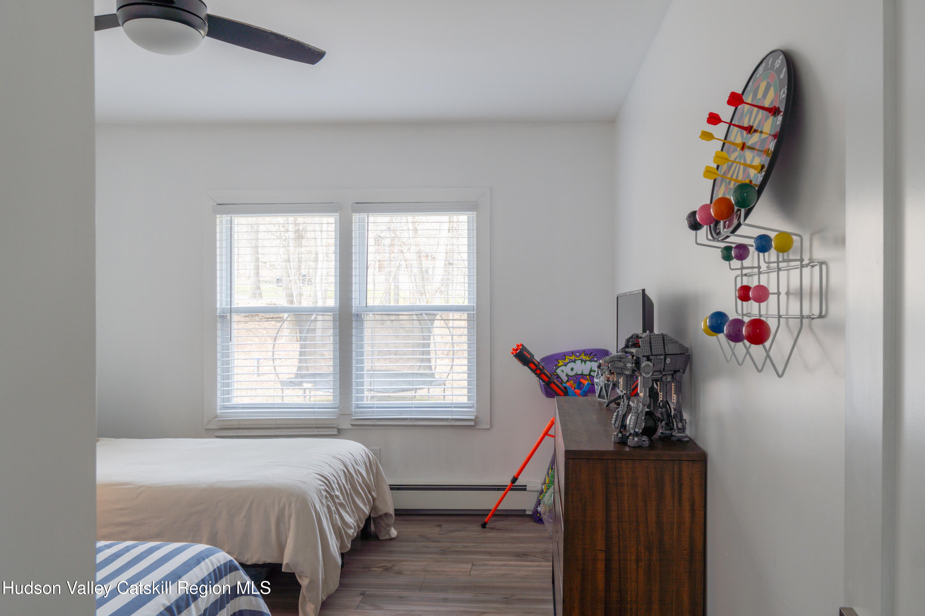 713 Oak Ridge Road Ellenville, NY 12428 - Photo 16 of 53 a bedroom with a bed and a window