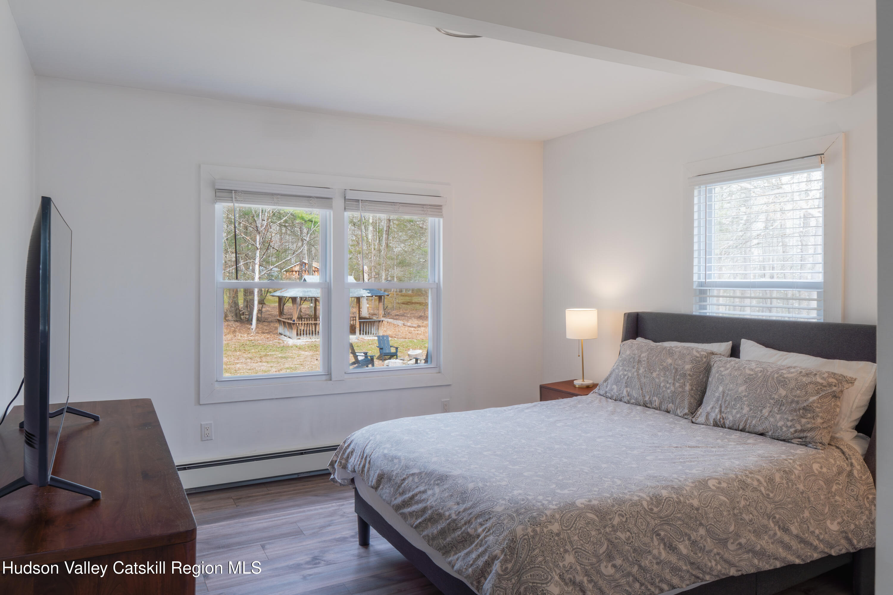 713 Oak Ridge Road Ellenville, NY 12428 - Photo 17 of 53 a bedroom with a bed and window