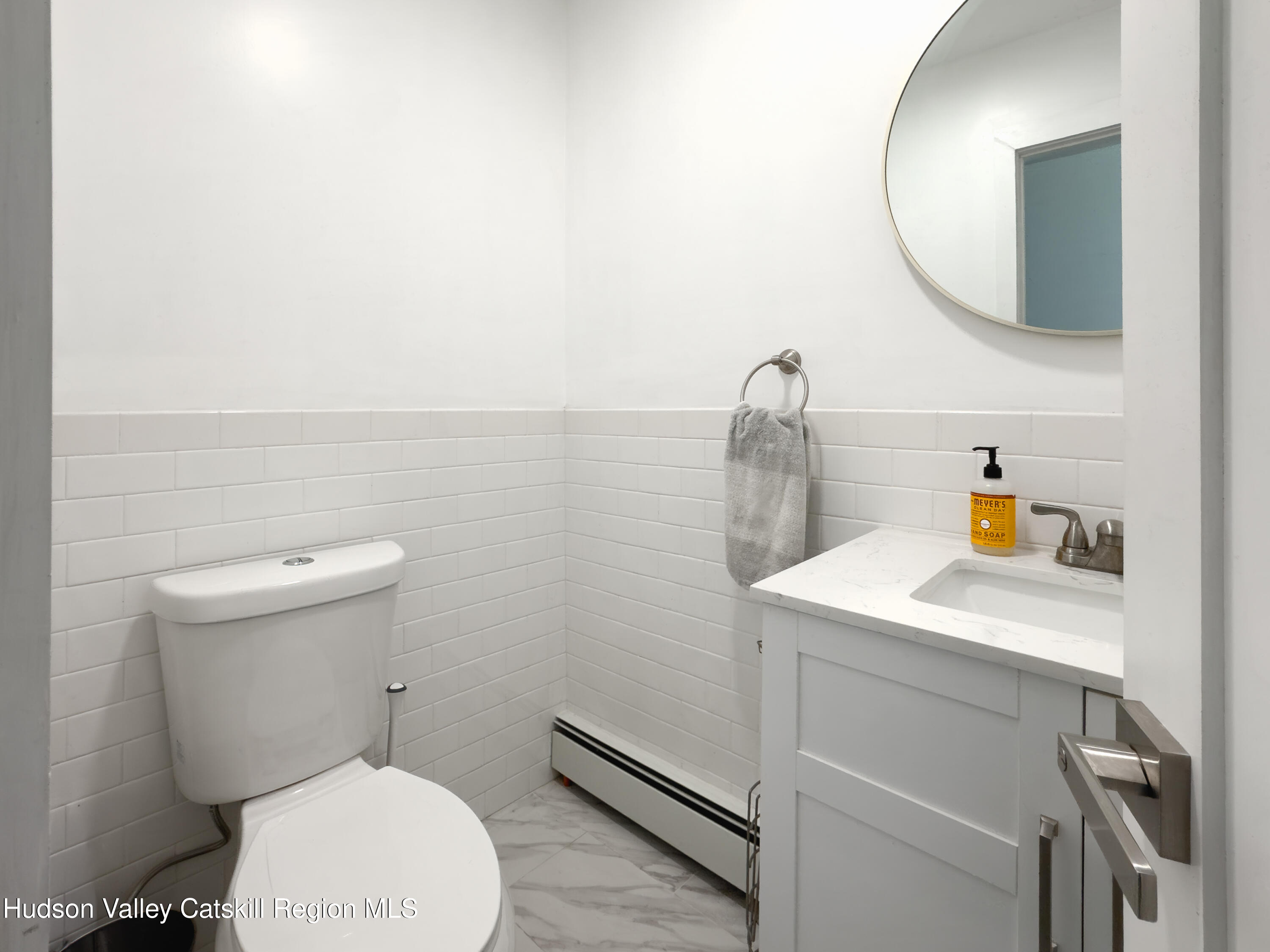 713 Oak Ridge Road Ellenville, NY 12428 - Photo 26 of 53 a bathroom with a sink a toilet and vanity