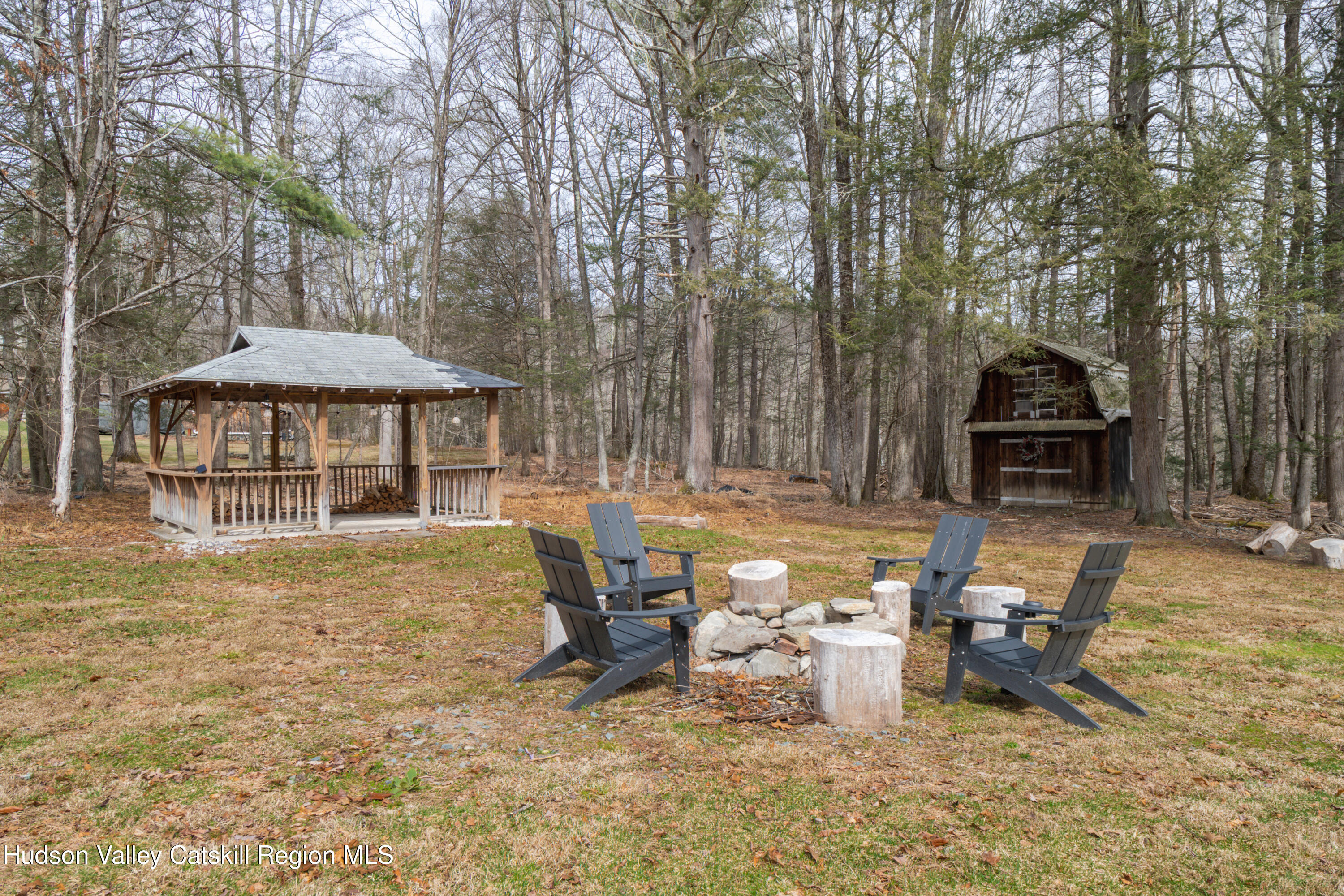 713 Oak Ridge Road Ellenville, NY 12428 - Photo 32 of 53 a view of a house with backyard porch and sitting area