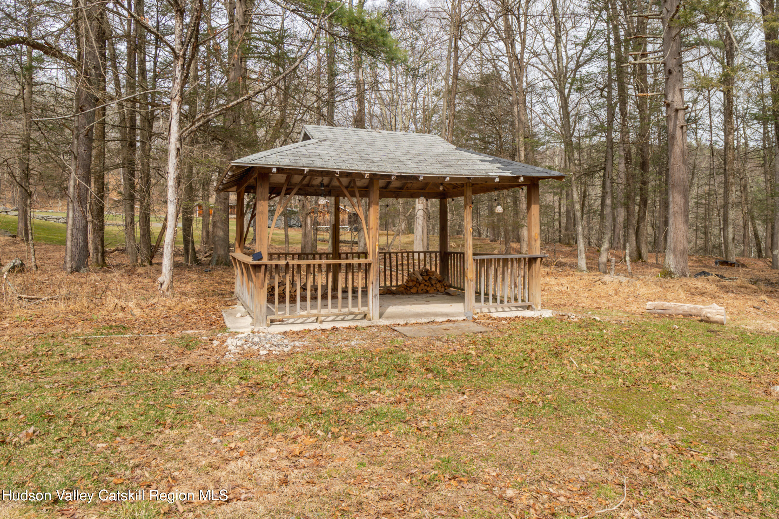713 Oak Ridge Road Ellenville, NY 12428 - Photo 35 of 53 a view of a house with backyard and sitting area