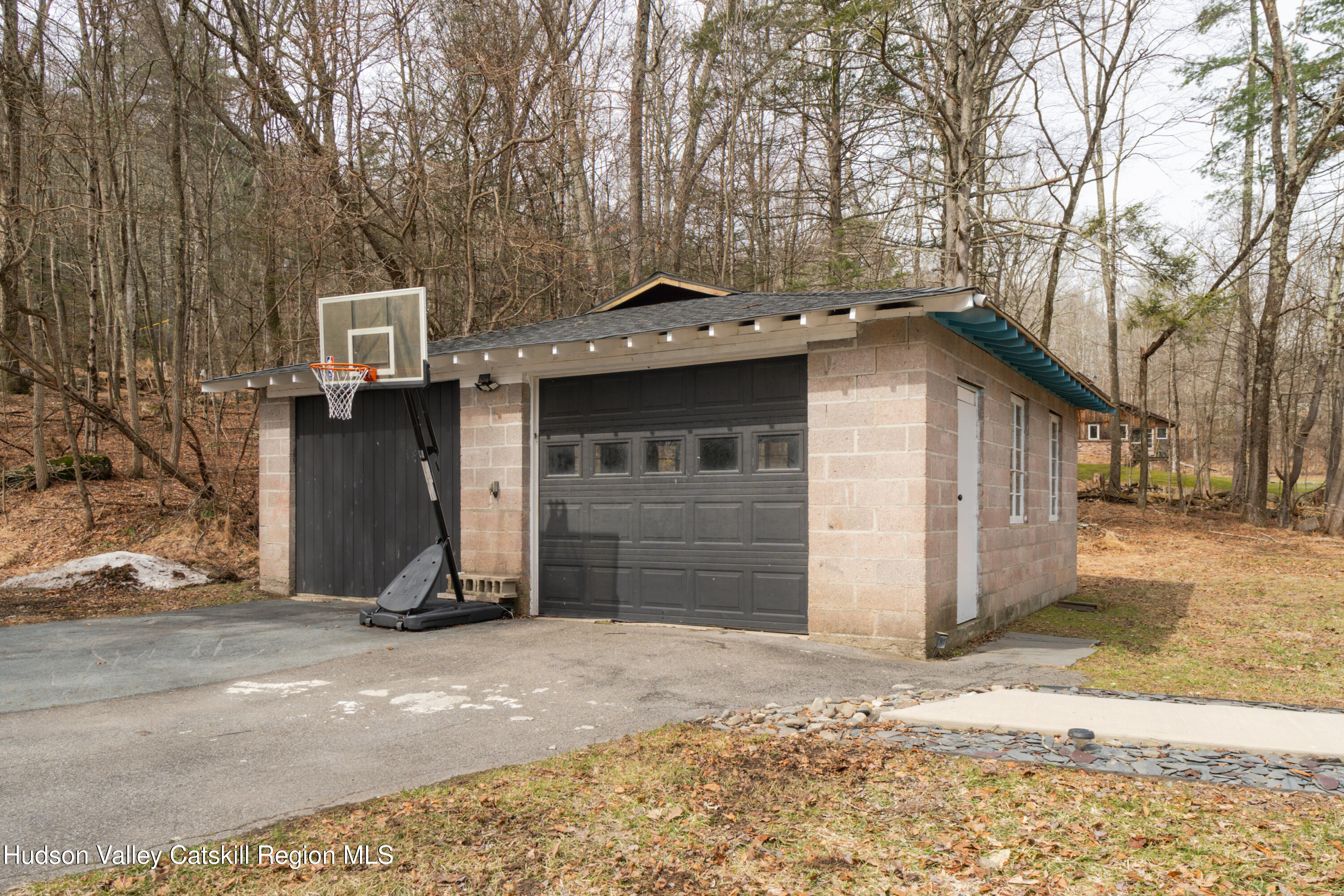 713 Oak Ridge Road Ellenville, NY 12428 - Photo 47 of 53 a front view of a house with a yard