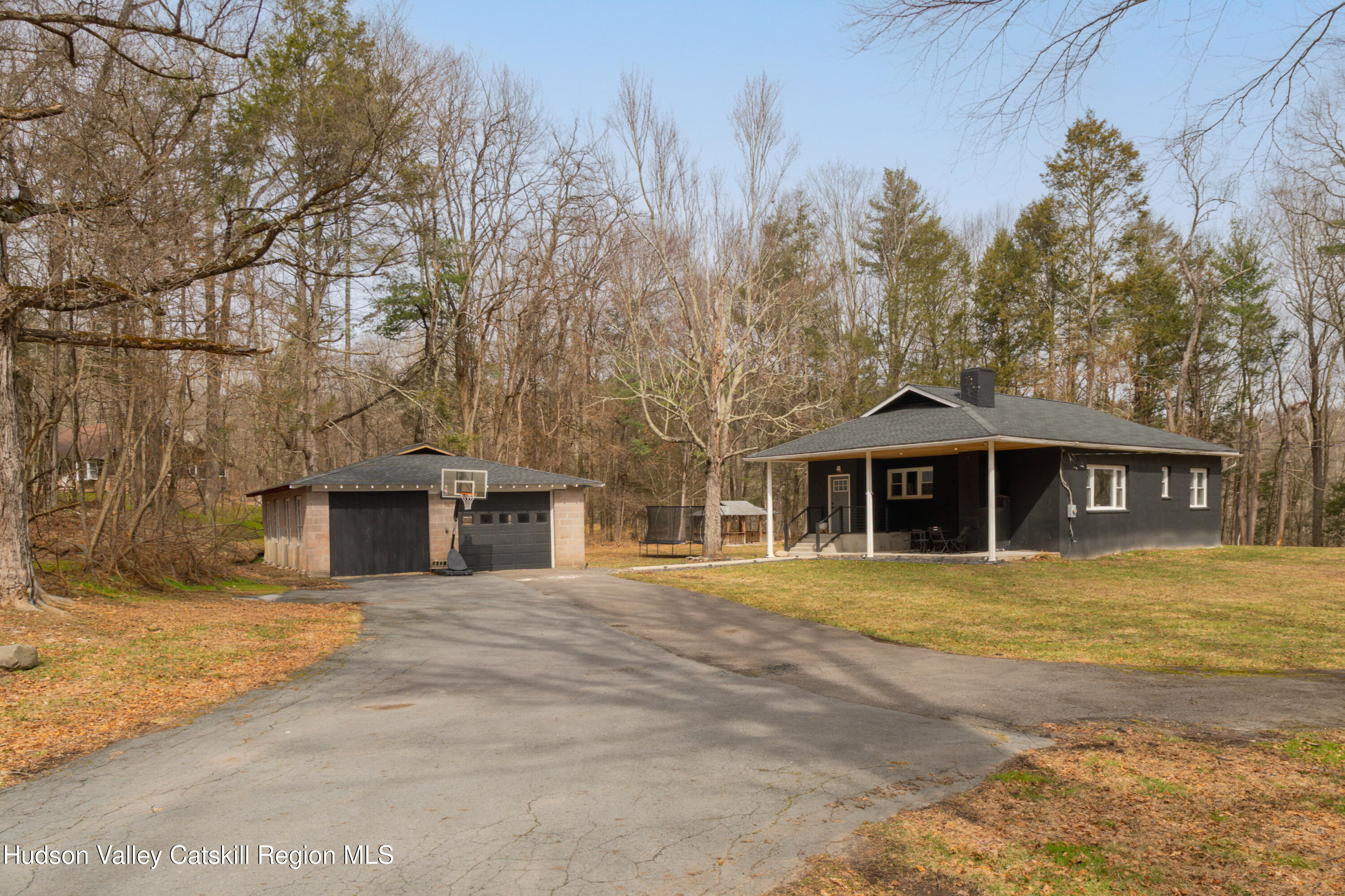 713 Oak Ridge Road Ellenville, NY 12428 - Photo 48 of 53 a front view of a house with a yard