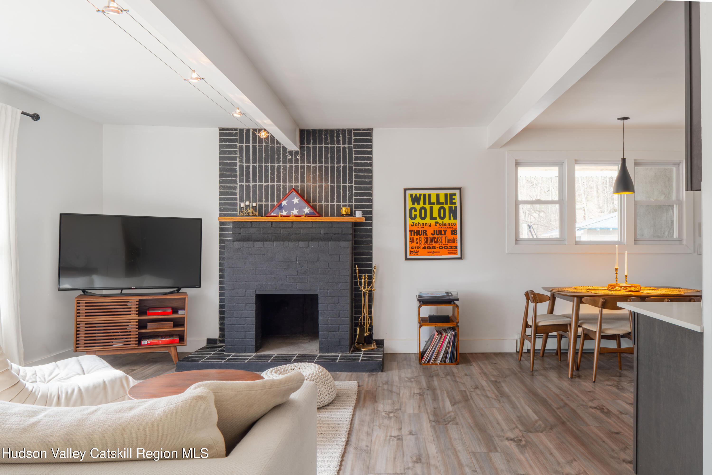 713 Oak Ridge Road Ellenville, NY 12428 - Photo 5 of 53 a living room with furniture and a flat screen tv