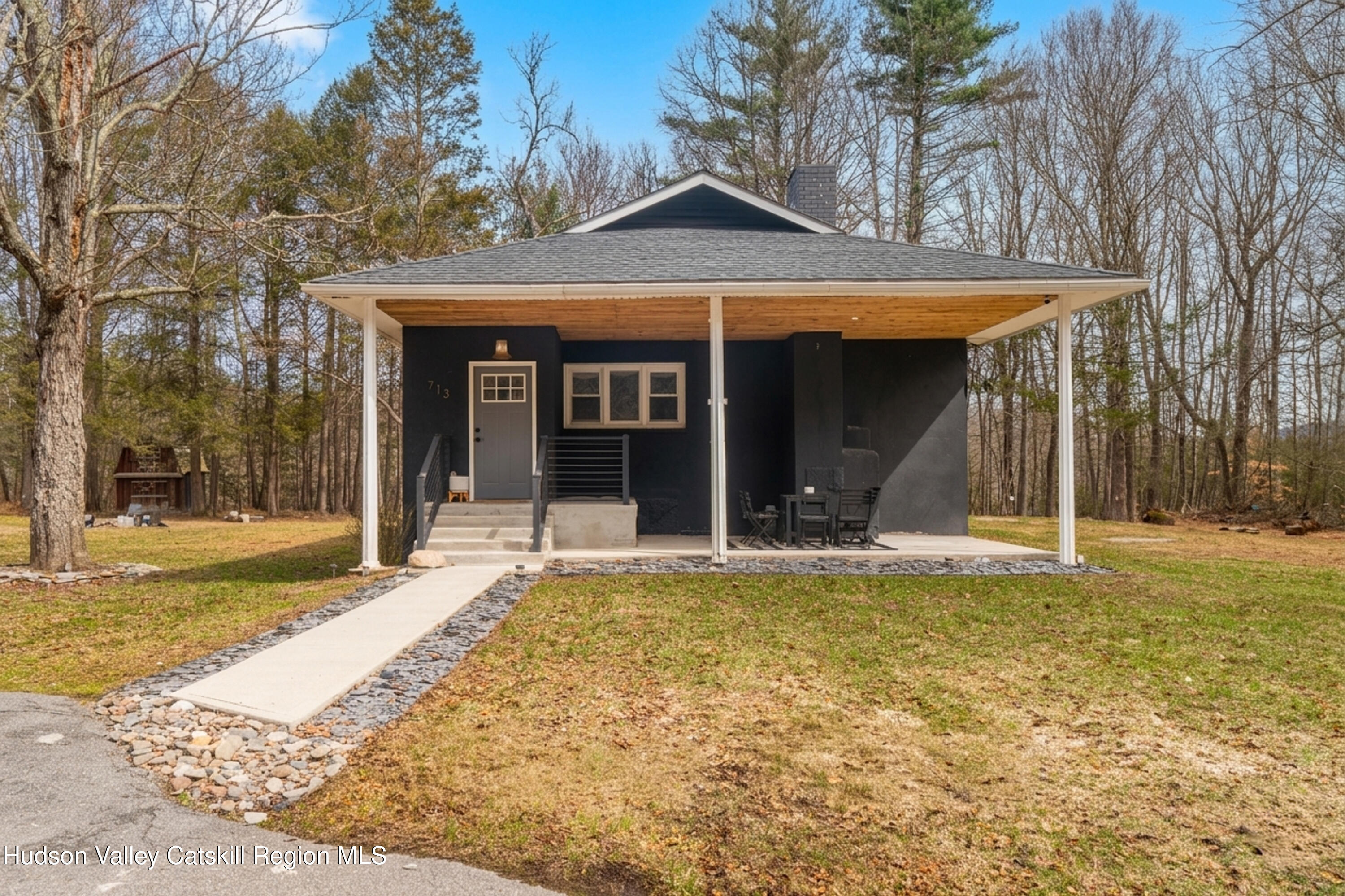 713 Oak Ridge Road Ellenville, NY 12428 - Photo 52 of 53 a view of a house with a large pool and a yard