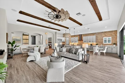 a kitchen with a sink stove and refrigerator