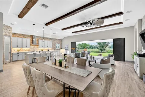 a view of a hallway with washer and dryer