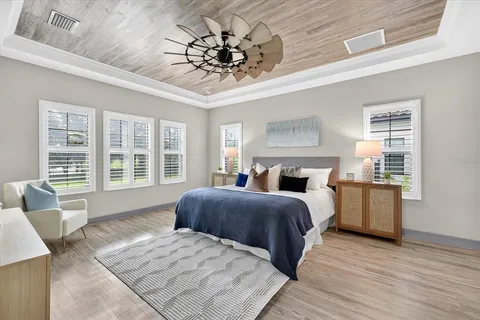 a view of a storage and utility room with washer and dryer